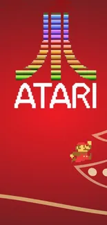 Atari logo with retro Mario on red background wallpaper.