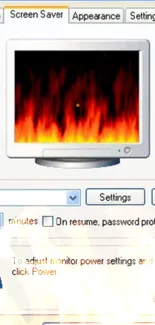 Retro Windows XP display with fiery screensaver in an iconic design.