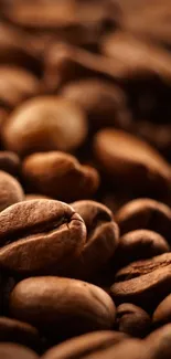 Close-up of coffee beans with rich brown tones, perfect for a warm mobile wallpaper.