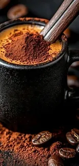 Steaming coffee in a black mug with cinnamon and cocoa powder.