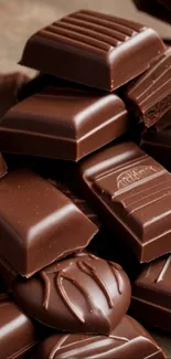 Rich dark chocolate squares stacked enticingly.