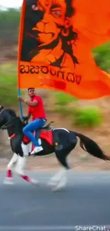 Horse rider carrying an orange flag in motion.