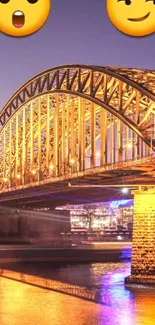 Bridge with golden lights and emojis at night over a reflective river.