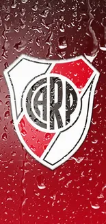 River Plate badge with red water droplet background.