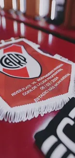 River Plate soccer banner with red background and team emblem.