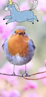 Robin perched among pink blooms with a whimsical unicorn above.