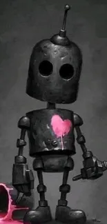 Black robot with pink heart graffiti on dark background.