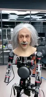 Robotic sculpture of Einstein in office setting.