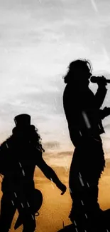 Silhouette of musicians performing at sunset in a rock concert scene.