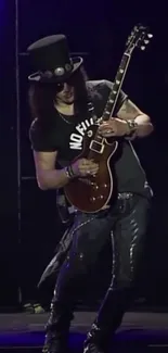 Guitarist passionately playing live on stage.