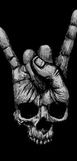 Rock hand skull illustration on black background.