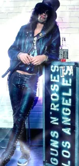 Rock musician in leather jacket leaning on music equipment case.