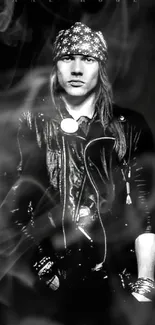 Black and white portrait of a rock musician with bandana and leather jacket.