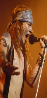 Rock musician passionately singing on stage.