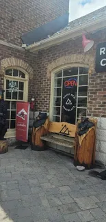 Rocky Chocolate shop entrance with bear carvings and red doors.