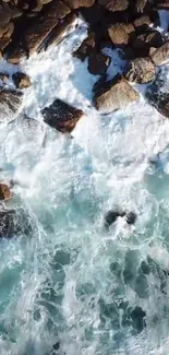 Aerial view of waves crashing on rocky coastline.