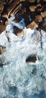 Aerial view of rocky coastline with crashing ocean waves.