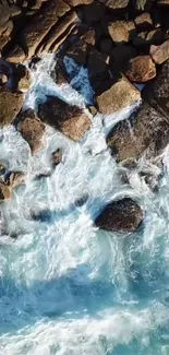 Aerial view of rocky coast with crashing waves.