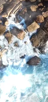 Aerial view of ocean waves crashing on rocky shore.