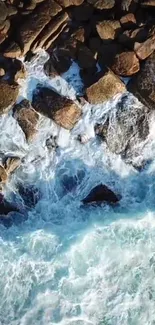 Aerial view of waves crashing onto rocky shore.