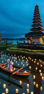 Couple in a boat with lanterns floating in Bali's evening glow.