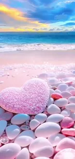 Romantic beach wallpaper with heart-shaped stones on a serene coastline.