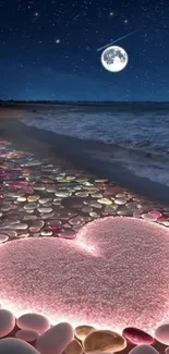 Heart of pink stones glowing on a moonlit beach at night.