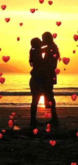 Silhouette of a couple embracing at sunset on a beach.