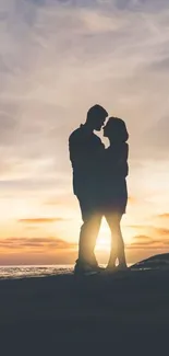 Couple silhouetted against a beach sunset, embodying romance and tranquility.