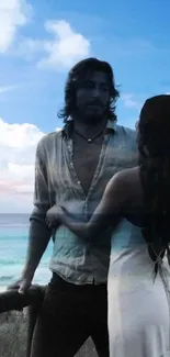 Romantic couple on a beach with ocean view and blue sky.