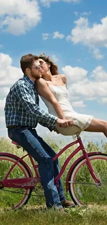 Couple sharing a romantic bicycle ride under a clear blue sky.