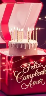 Red gift box with birthday cake and candles.