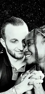 Romantic black and white couple embracing in an elegant portrait.