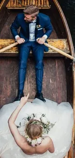 Romantic couple in a wooden boat on a serene river.