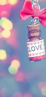 Romantic bokeh background with love bottle and red ribbon.