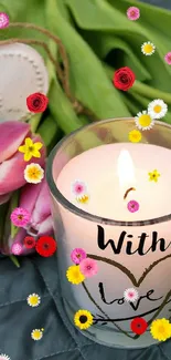 Romantic candle and pink tulips with heart decor.