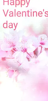 Romantic cherry blossom wallpaper with 'Happy Valentine's Day' text.