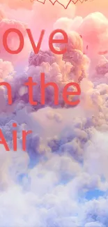 Pink cloud wallpaper with 'Love in the Air' text.