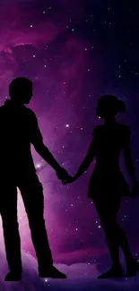 Silhouette couple against a purple cosmic background with stars.