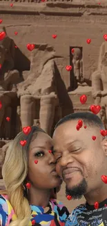 Couple sharing a kiss with an ancient temple and floating hearts background.