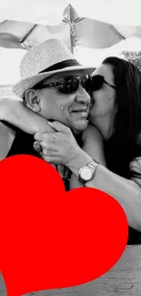 Black and white couple with red heart overlay.