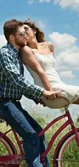 Romantic couple enjoying a bike ride under a blue sky.