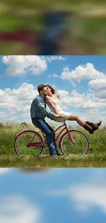 Romantic couple kissing on a bicycle under a blue sky.