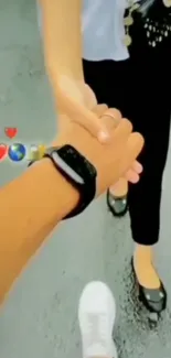 Couple holding hands romantic wallpaper with love emojis.