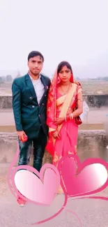 Romantic couple in pink attire with heart design.