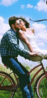 Romantic couple enjoying a bicycle ride under a blue sky.