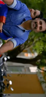 Couple riding a scooter amidst lush greenery.