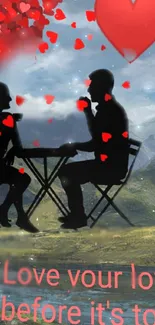 Silhouette of couple with red hearts in a mountain setting.