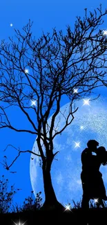 Couple silhouette kissing under full moon in blue night.