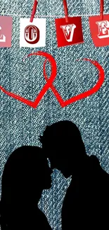 Romantic silhouette with denim and red heart accents background.